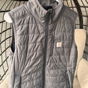 Women’s relaxed fit vest. Zippered with pockets. Packable, warm.